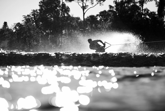 Wakeboarder Cutting into Wake