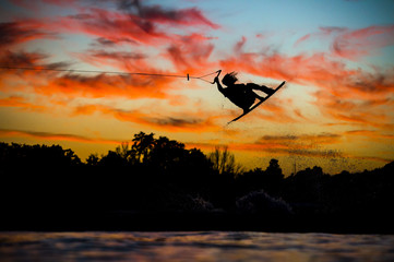 Wakeboarder Catching air During Sunset