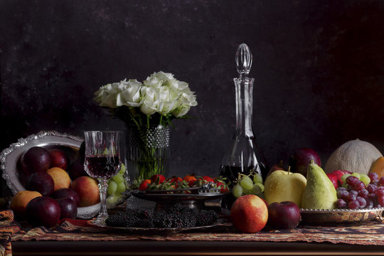 Fruit and vegetables on a table in the style of an old painting