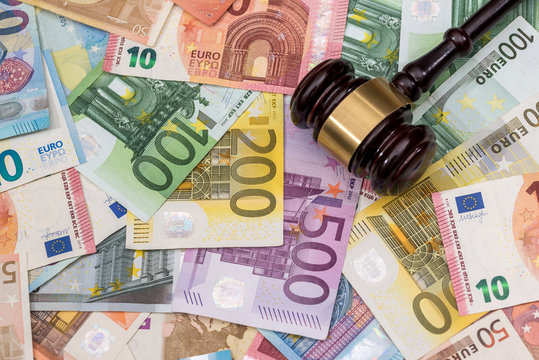 Justice and euro currency money. Representation of corruption and bribery in the judiciary.