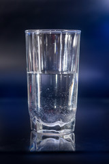 Glass of water isolated on black background