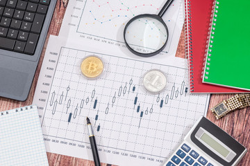 data on charts and graphs  with laptop and notepad on desk, finance  accounting.