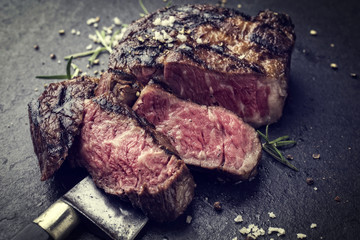 Barbecue aged Wagyu Rib Eye Steak as close-up on slate - Vintage