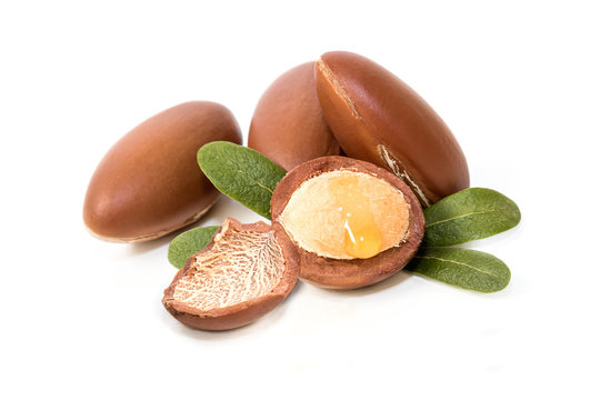 Argan nuts, with interior detail and oil drop