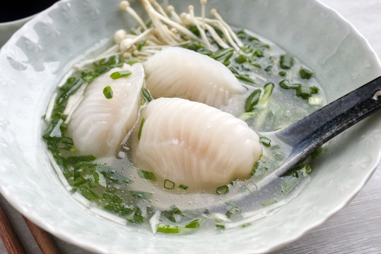 Traditional Japanese Gyoza Ramen Soup as close-up in a bowl