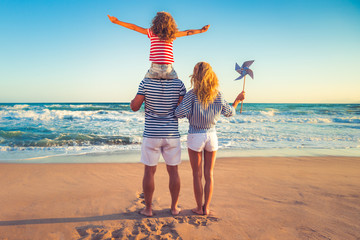 Happy family having fun on summer vacation