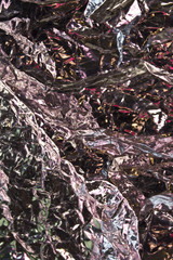 Fototapeta premium Close Up of Coloured Metal Foil Abstract Background