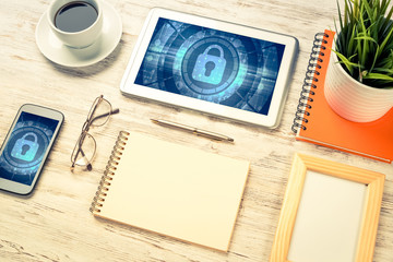 Web security and technology concept with tablet pc on wooden tab