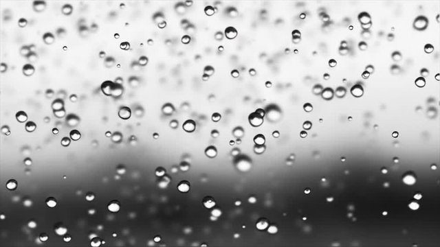 Raindrop series - small raindrops falling on the bright background. Loopable.