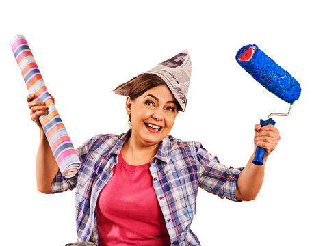 Repair home elderly woman holding paint roller for wallpaper. Happy senior woman in newspaper cap renovation apartment on isolated.