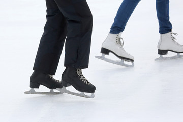 Naklejka premium feet skating on the ice rink