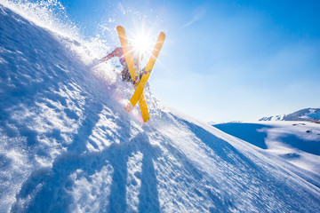 Skiing in the snowy mountains, Carpathians, Ukraine, good winter day, ski jump, fall, ski season