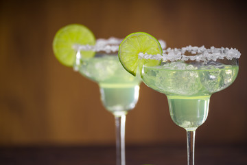 Cocktails of Margarita decorated with limes