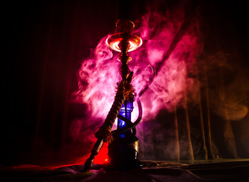 Hookah hot coals on shisha bowl with black background. Stylish oriental shisha