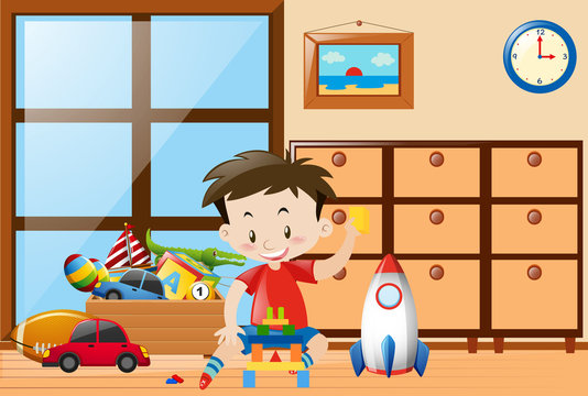 Boy playing toys in room