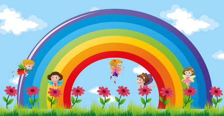 Obraz na płótnie Canvas Fairies flying over the rainbow