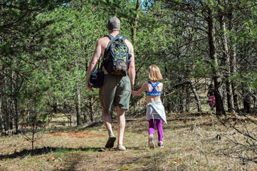 Naklejka na ściany i meble man and child on nature trail