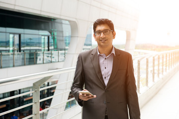 indian male walking at airport