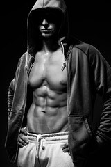 Fototapeta na wymiar Portrait of strong healthy handsome Athletic Man Fitnes