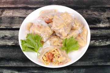 Steamed Dumpling stuffed soft bamboo pole shoots.