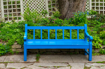Blue bench in the garden