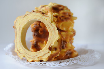 Handmade traditional baumkuchen layer cake baked over fire in eastern Poland