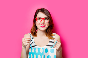 young woman with shopping bag