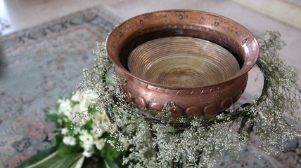 Ancient Small baptismal font in copper decorated with flowers du