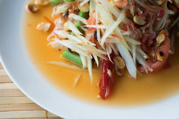 top view. papaya salad seems spicy but also delicious. this image for foot and nutrition concept