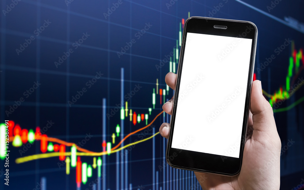 Poster hand holding smart phone. background stock market chart,stock market data on led display concept. sm