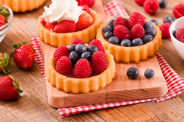 Tartlets with forest fruits. 