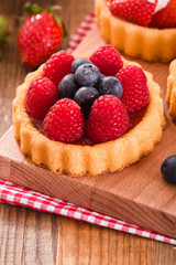 Tartlets with forest fruits. 