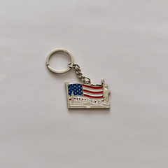 Manhattan, New York figure keychain on a white background