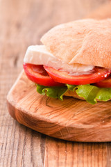 Puccia bread with mozzarella and tomato.