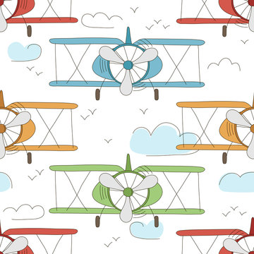 Hand drawn vector vintage seamless pattern with cute little planes in sky with clouds. Adventure dream background. Childish illustration. Kid wallpaper.