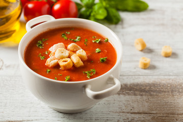 Traditional tomato soup, served with croutons.