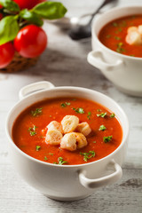 Traditional tomato soup, served with croutons.