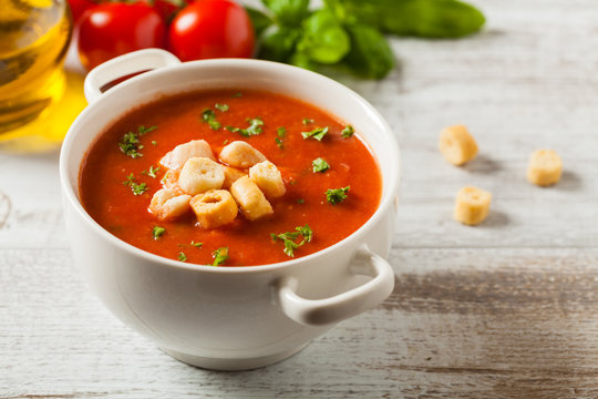 Traditional tomato soup, served with croutons.