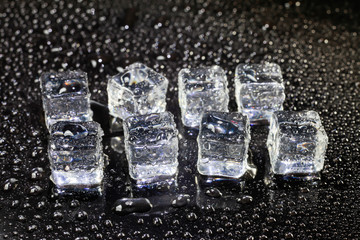 ice cubes on black background.