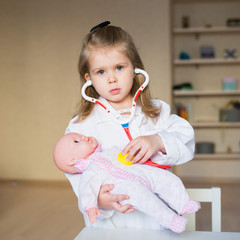 child plays in the hospital at home