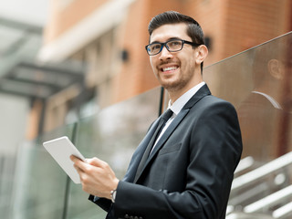 Portrait of handsome businessman outdoor