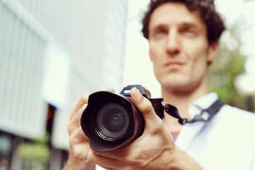 Male photographer taking picture