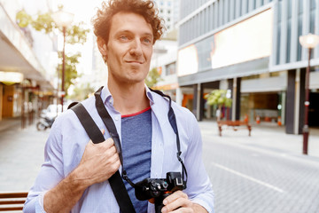 Male tourist in city