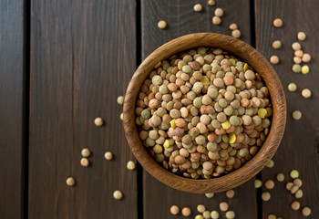 lentils on wooden surface