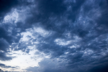 Obraz premium Beautiful clouds at sunset after rain as background .
