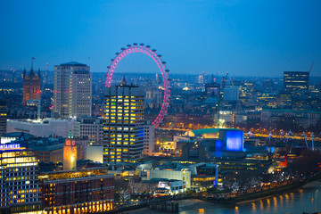 Obraz premium London at night, view at River Thames embankment and London bridge with night lights reflection 