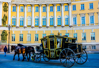 A carriage pulled by horses on city street. St Petersburg. Russia