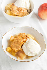 peach cobbler with ice cream