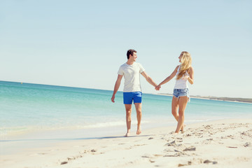 Romantic young couple on the beach