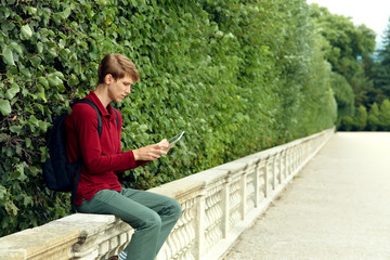young man using tablet computer